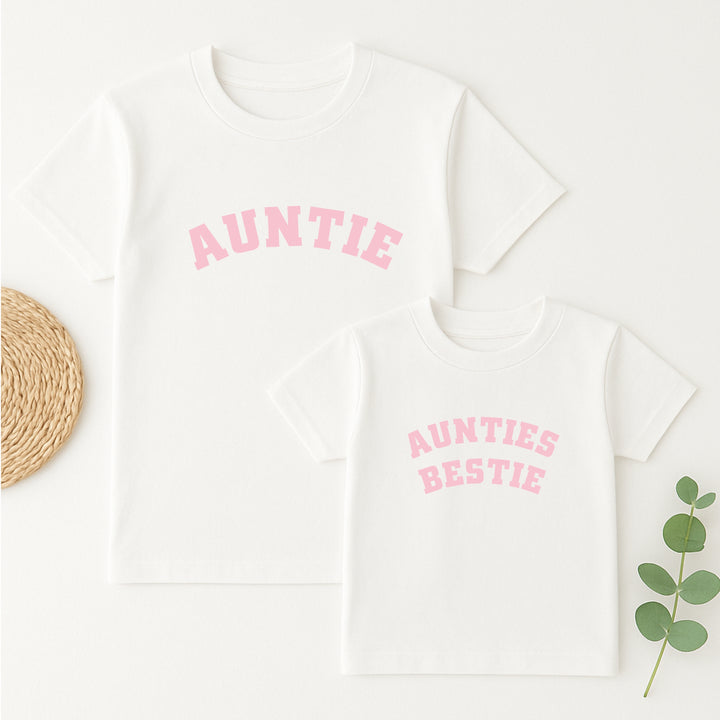 White tank tops with 'Auntie' and 'Aunties Bestie' text on a white background