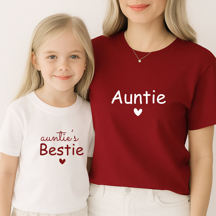 Two people wearing matching shirts with 'Auntie' and 'auntie's Bestie' text.