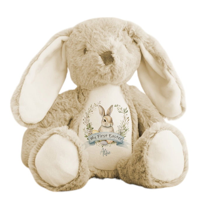 Personalised beige bunny Easter teddy that says 'My First Easter Alfie'. This design features a grey bunny in a wreath
