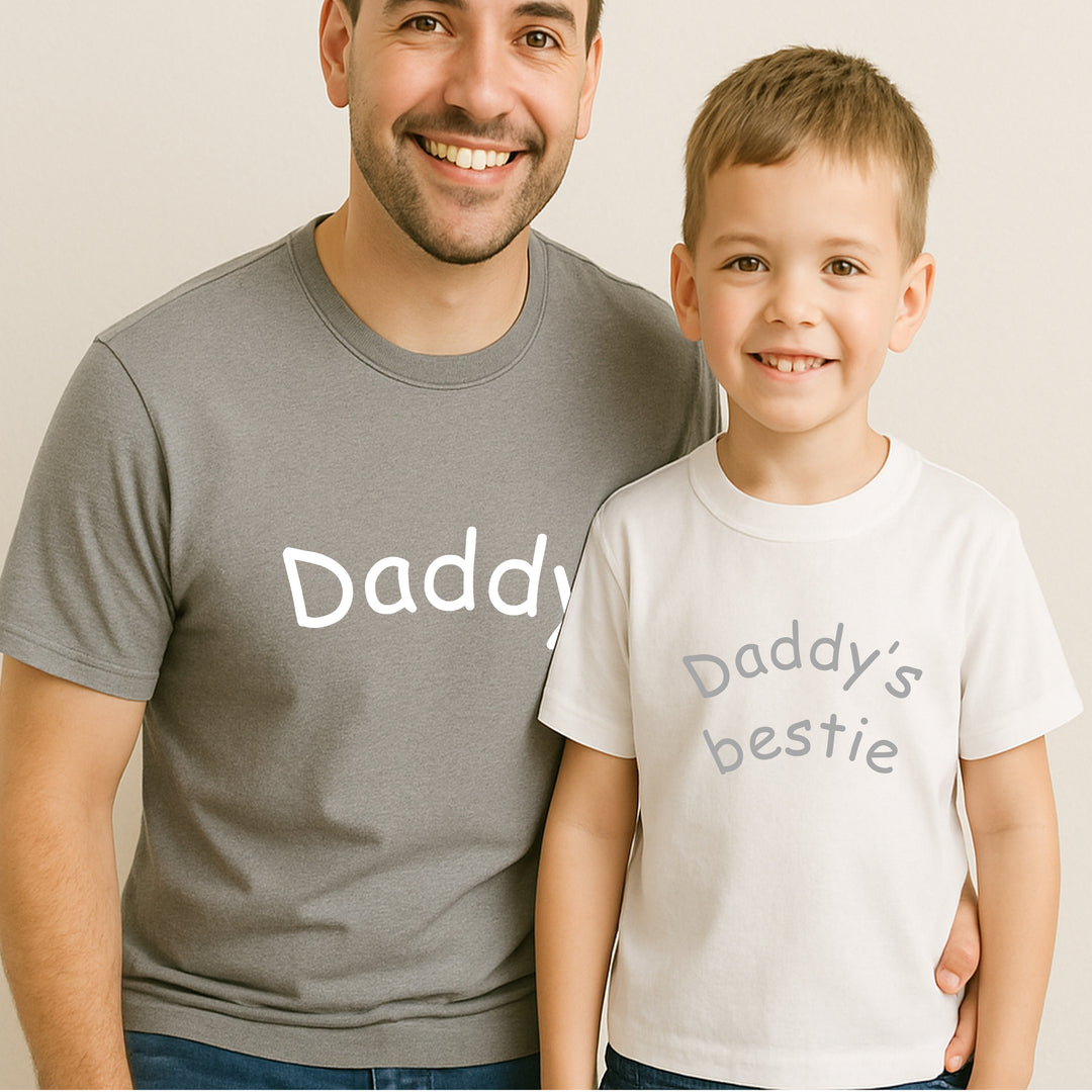 Man and child wearing matching shirts with 'Daddy' and 'Daddy's bestie' text.