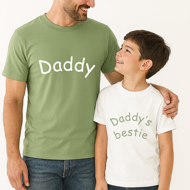 Man and child wearing matching shirts with 'Daddy' and 'Daddy's bestie' text.