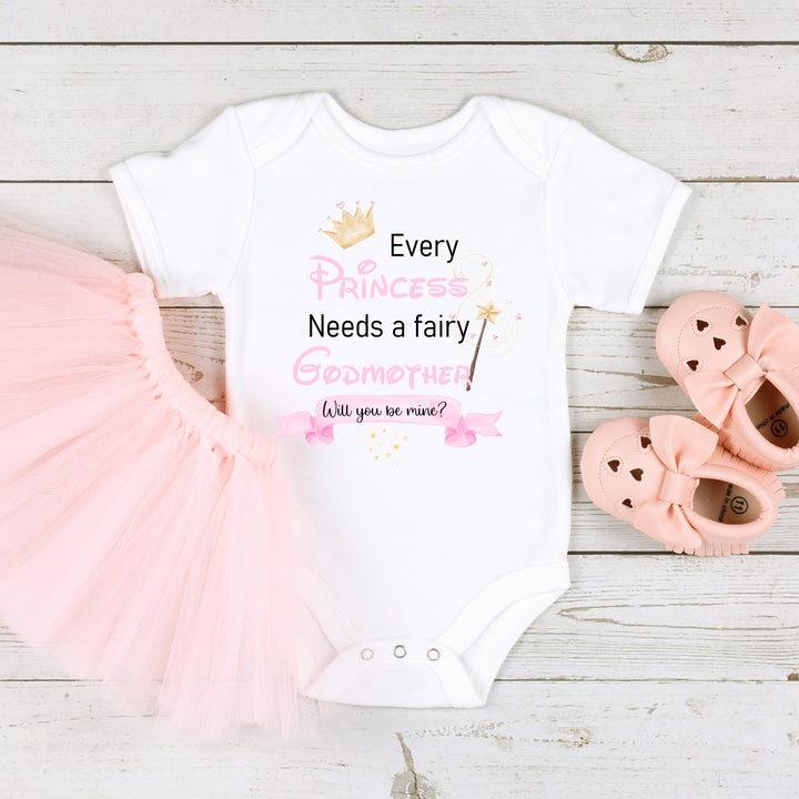 Baby announcement vests that says: 'Every Princess Needs a fairy Godmother Will you be mine?'