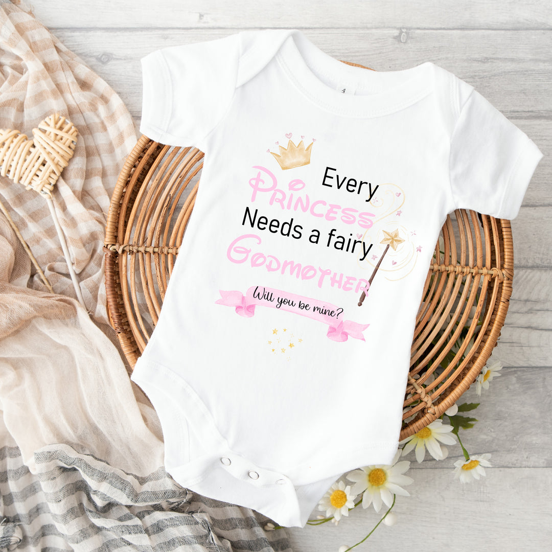 Baby announcement vests that says: 'Every Princess Needs a fairy Godmother Will you be mine?'