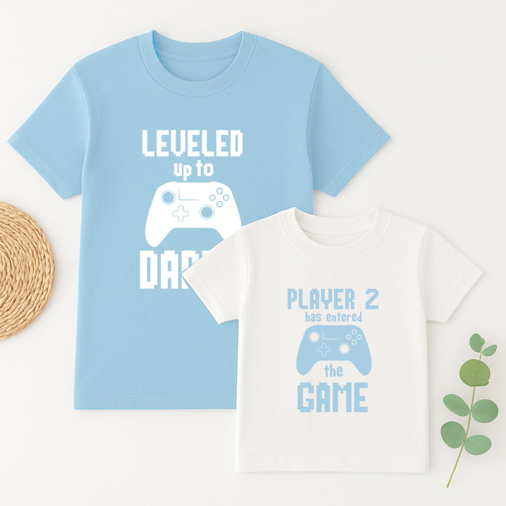 Two children's t-shirts with gaming-themed text and graphics on a white background.