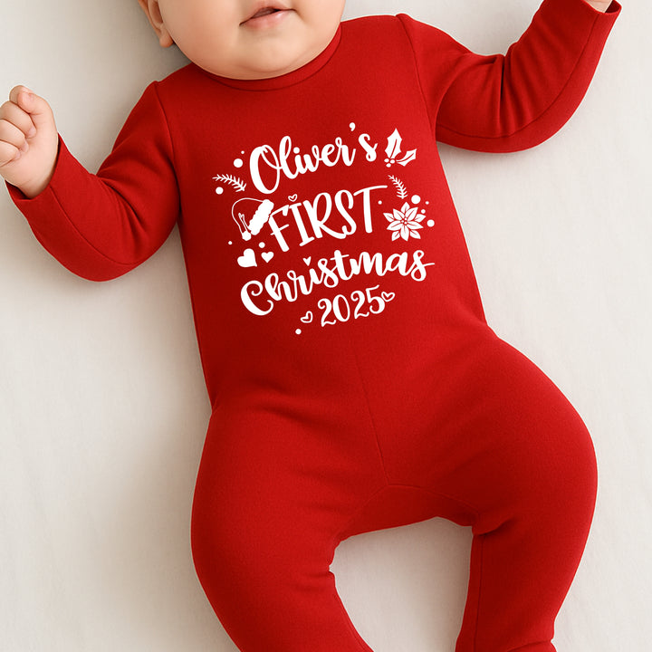 Red baby onesie with 'Oliver's First Christmas 2025' text on a white background