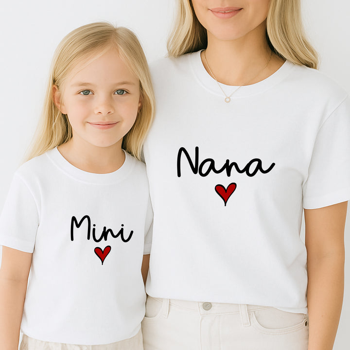 Two people wearing white t-shirts with 'Nana' and 'Mini' text and red heart symbols.