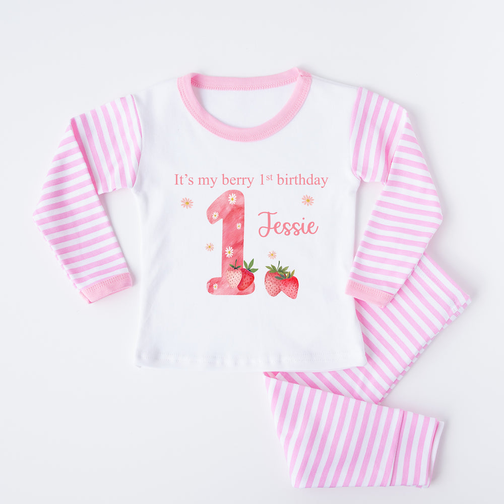 Personalised pink stripe pyjamas that say 'It's my berry 1st birthday 1 Jessie' This design features a pink 1 with strawerrys around it