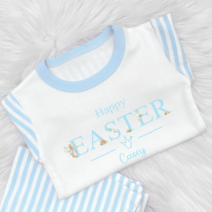 Peronalised blue striped happy easter pyjamas saying 'Happy Easter Casey' This design features a rabbit wearing a blue jacket