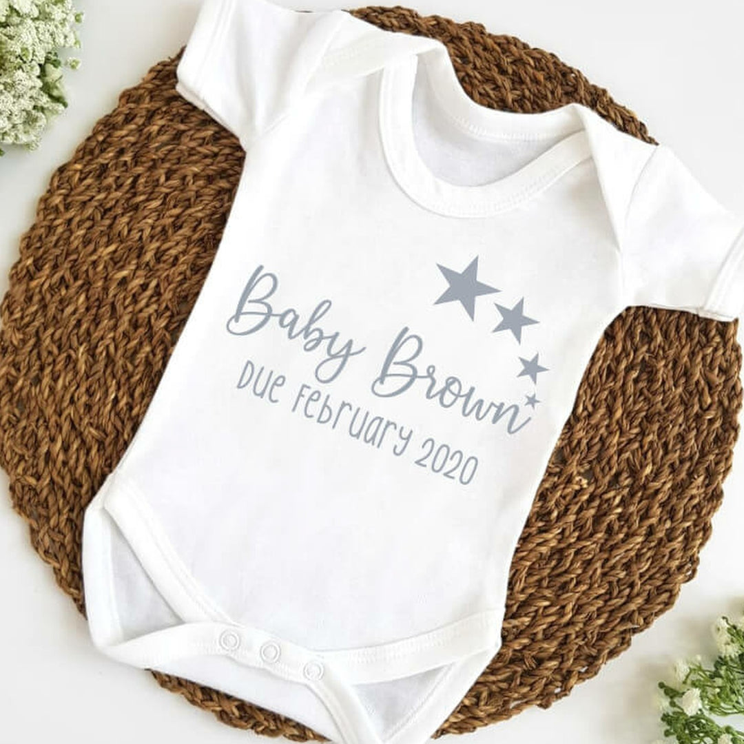 Baby announcement vests that says: Baby Brown Due February 2020