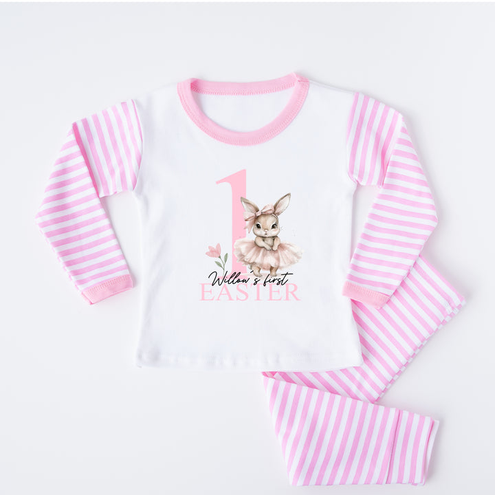 Personalised pink stripe Easter pyjamas that say '1 Willow's first Easter'. This design features a ballerina bunny 