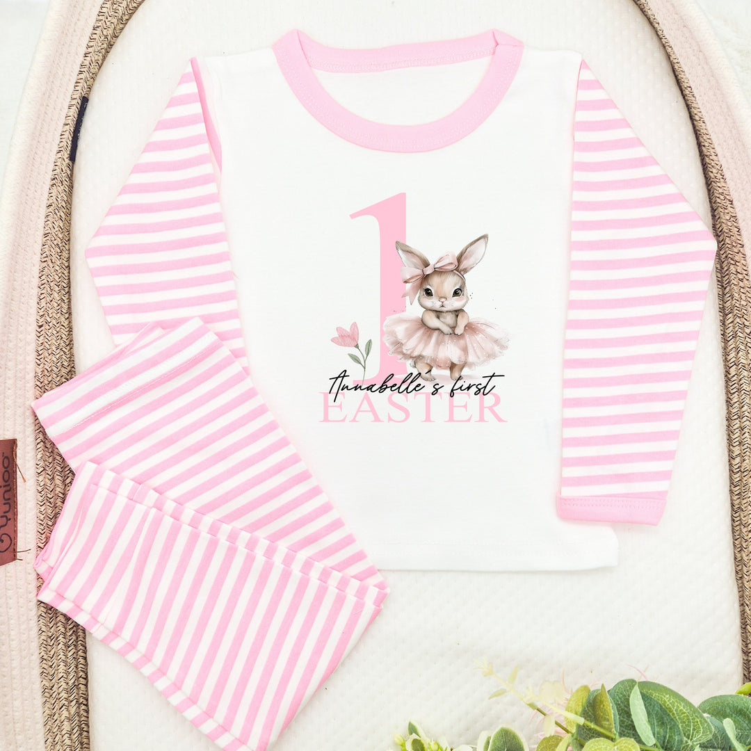 Personalised pink stripe Easter pyjamas that say '1 Annabelle's first Easter'. This design features a ballerina bunny 