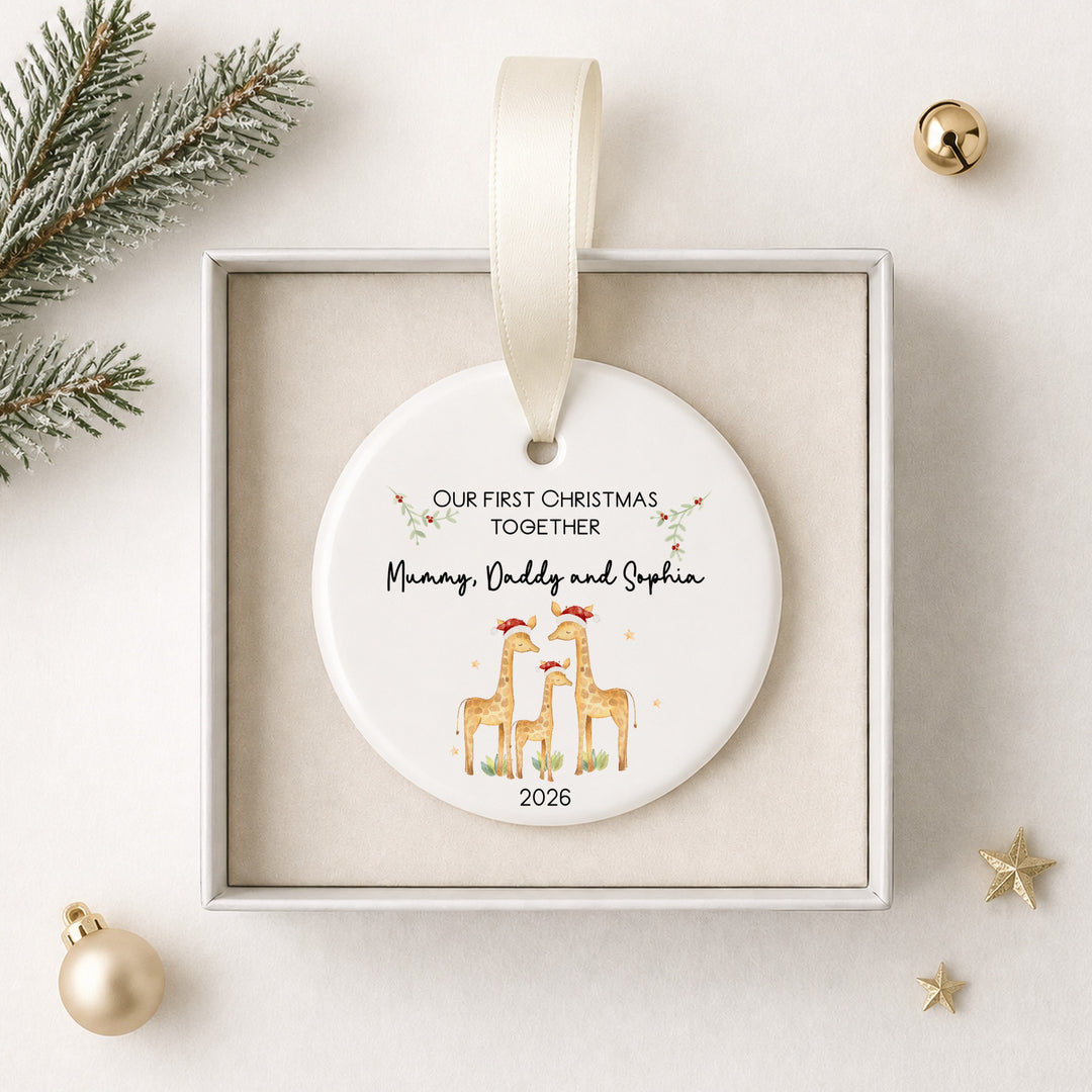 Personalised Ceramic Giraffe Our First Family Christmas Bauble