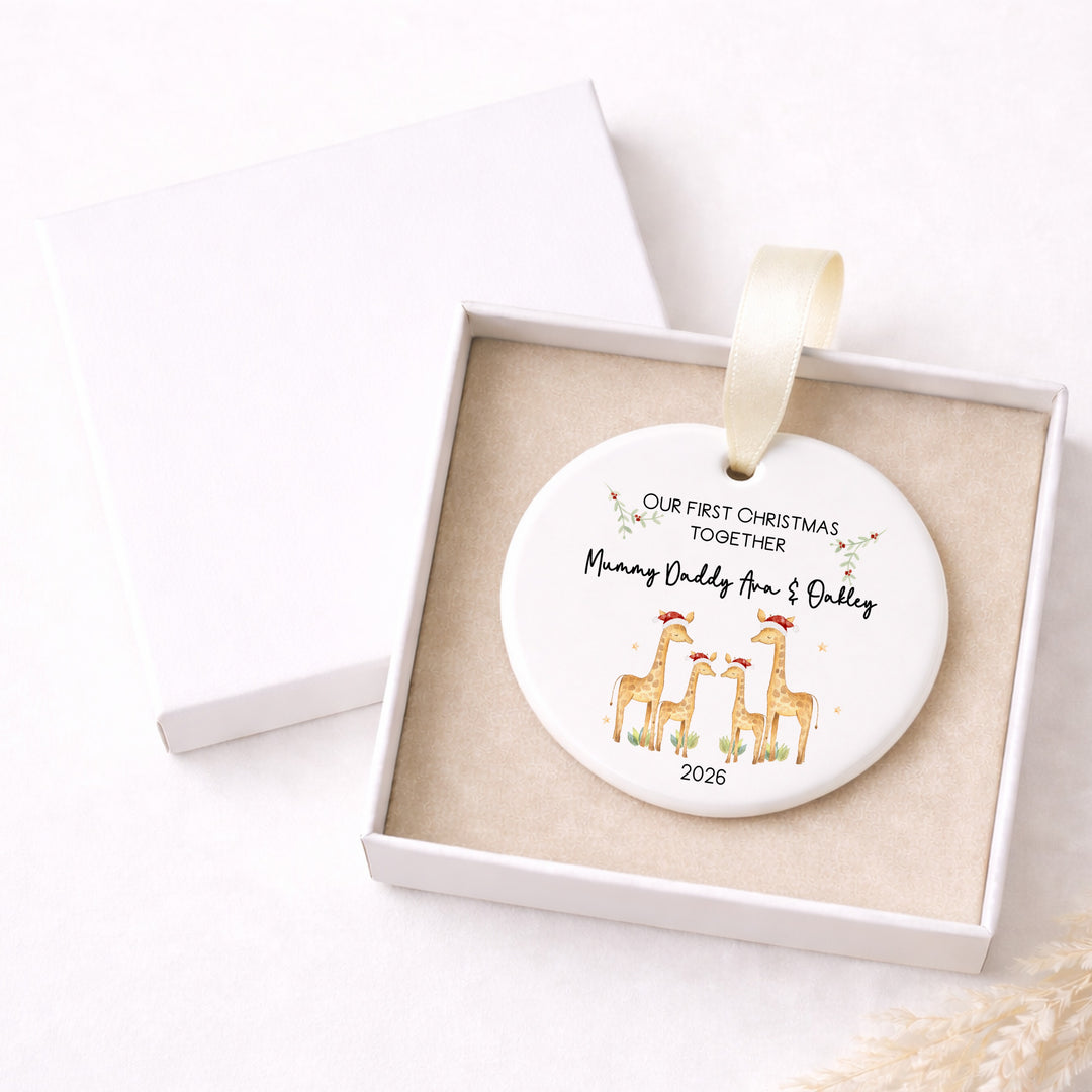 Personalised Ceramic Giraffe Our First Family Christmas Bauble