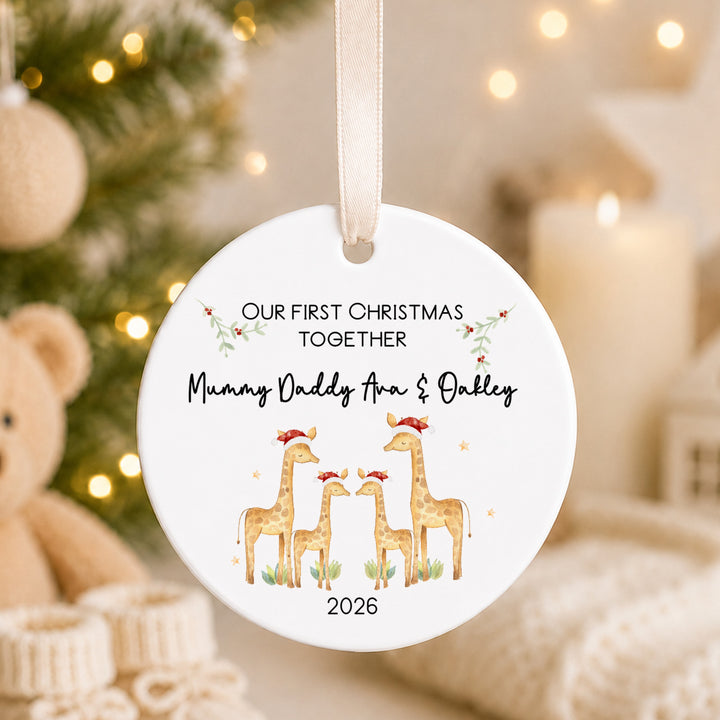 Personalised Ceramic Giraffe Our First Family Christmas Bauble