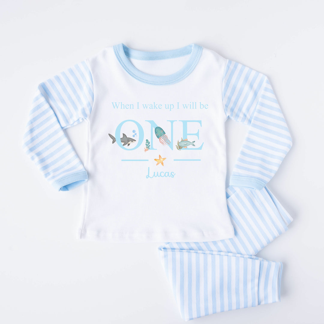 Blue Stripe birthday pyjamas that say 'When I wake up I will be ONE Lucas'. This design features sealife creatures