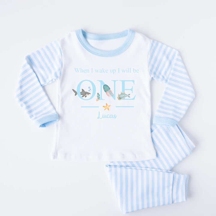 Blue Stripe birthday pyjamas that say 'When I wake up I will be ONE Lucas'. This design features sealife creatures