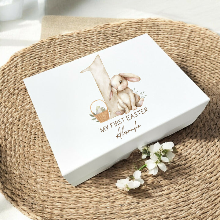 Personalised Easter Treat box that says 'My First Easter Alexander'. This design features a big beige 1 with a beige bunny next to it 