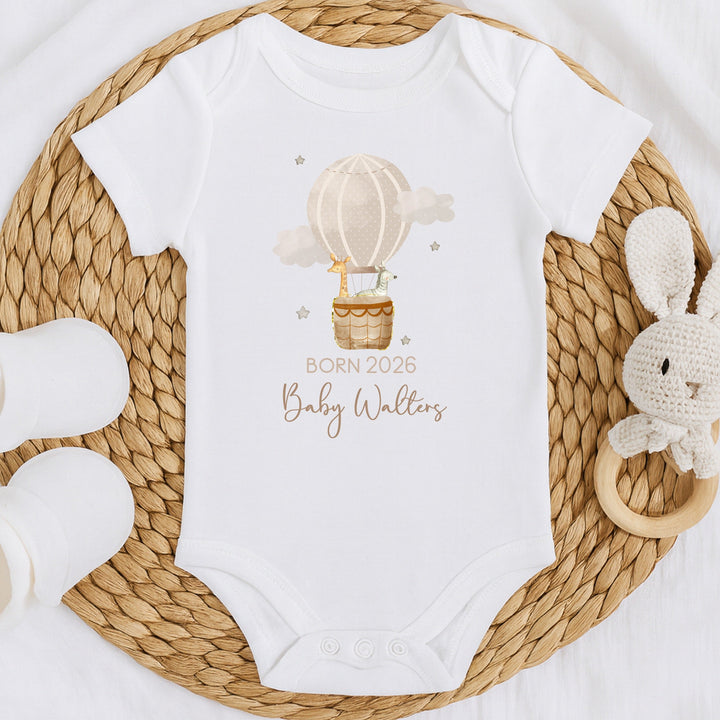 Personalised Born in 2026 Beige Hotair Balloon Baby Grow, Vest or Bib