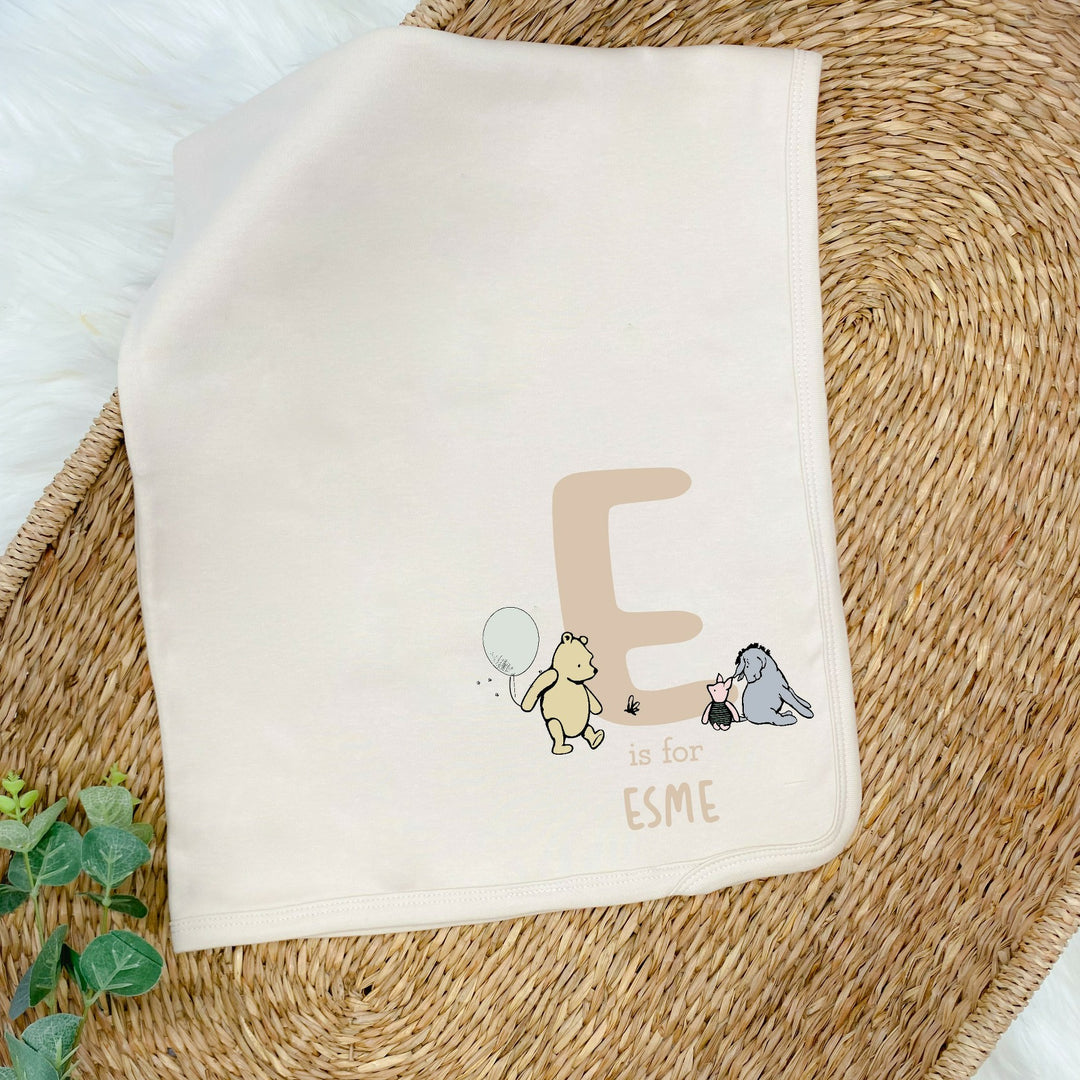 Personalised Beige Winnie the Pooh Initial Babygrow with optional Headband, Hat, Blanket