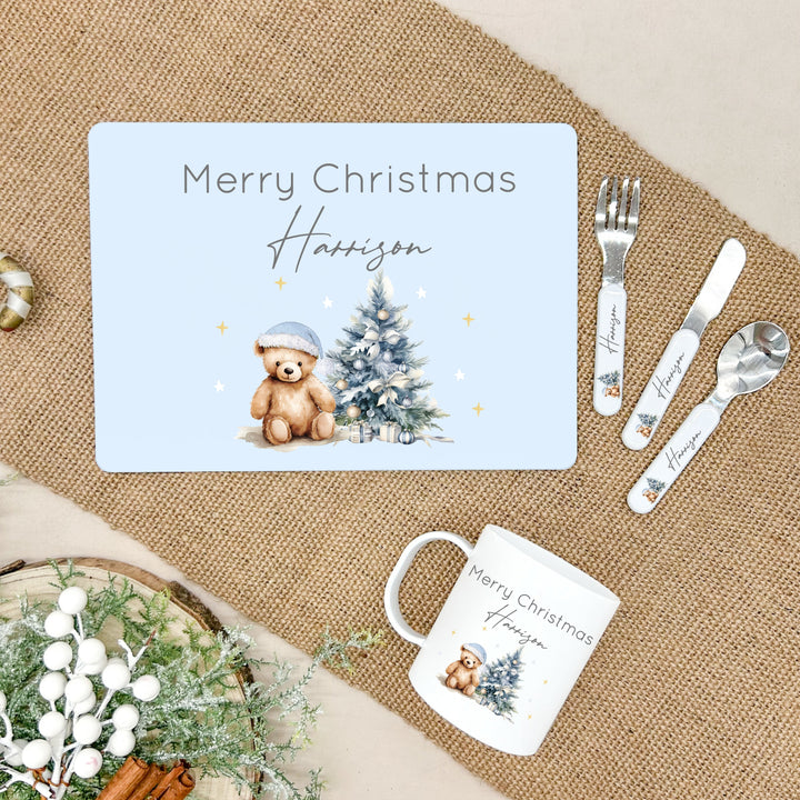 Personalised Blue Teddy Christmas Place Mat With Optional Cutlery and Mug