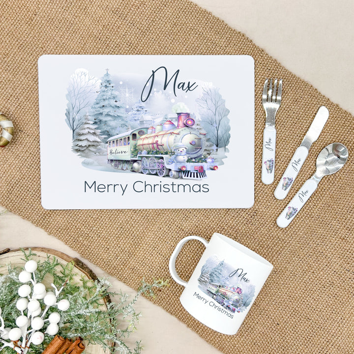 Personalised Blue Festive Train Christmas Place Mat With Optional Cutlery and Mug