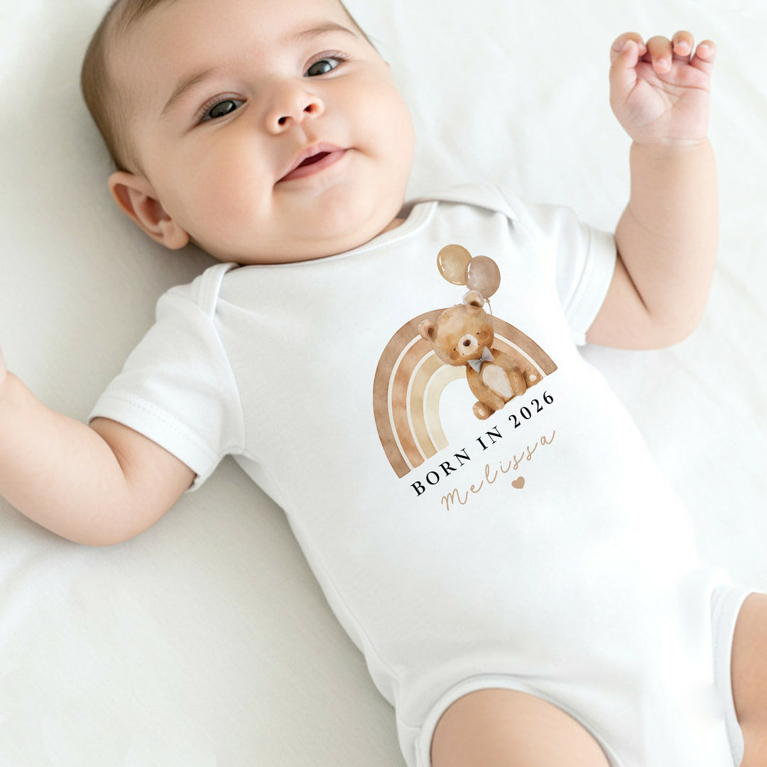Personalised Beige Bear Rainbow Born in 2026 Baby Grow, Vest or Bib