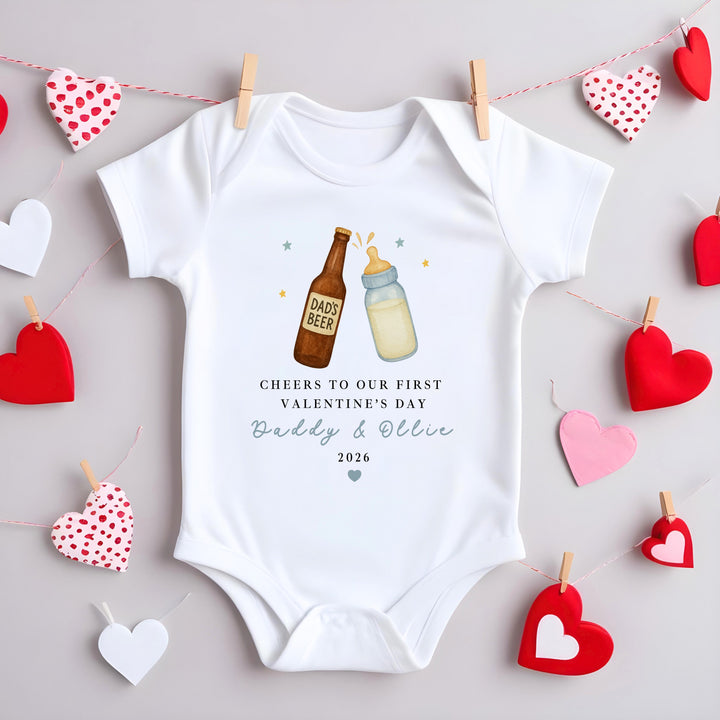 Personalised Blue Cheers Our First Valentines Day Baby Grow, Vest or Bib