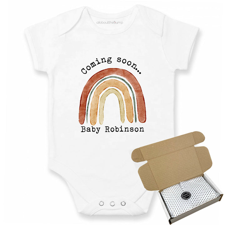 This baby announcement vest can be brought in a box lined with tissue paper