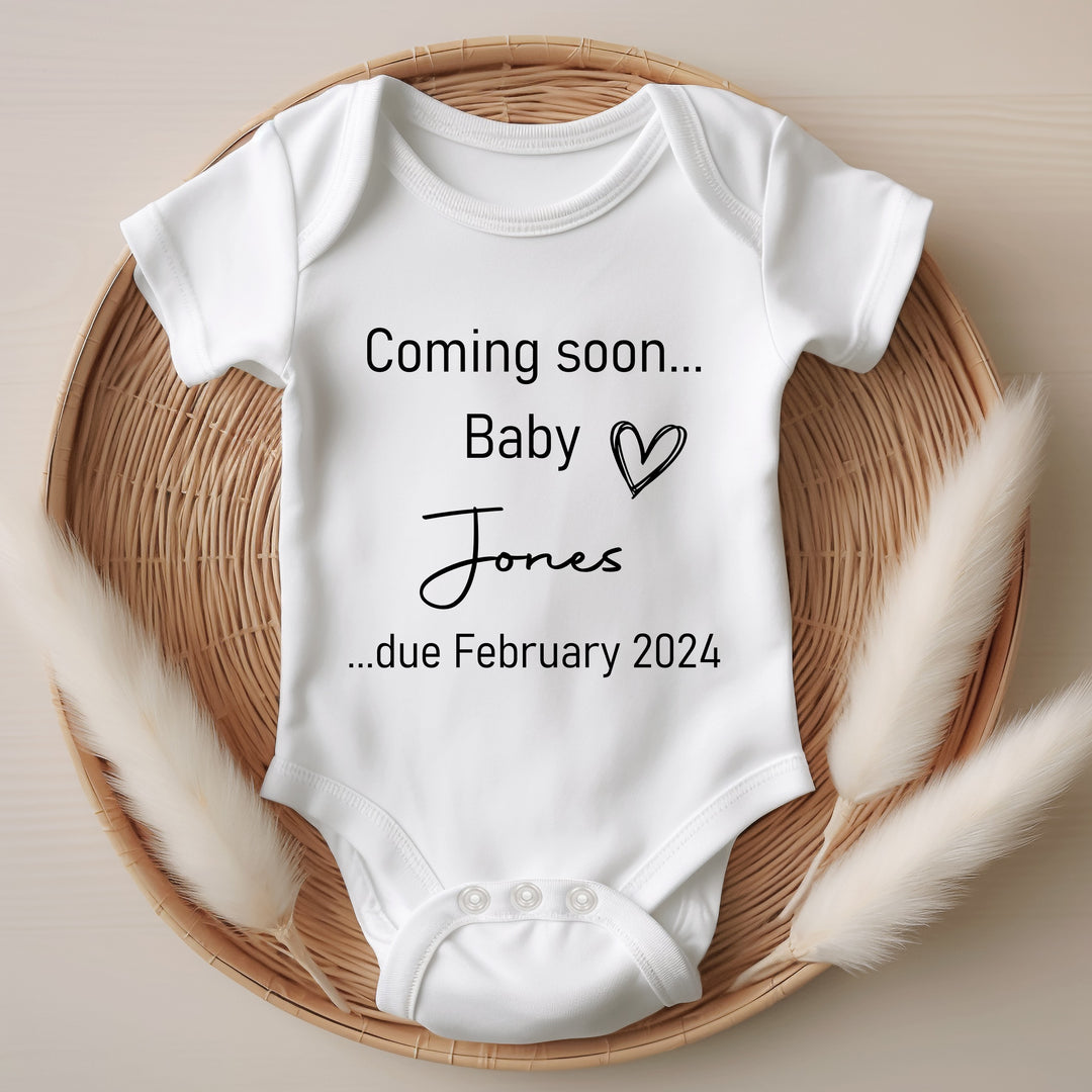 Baby announcement vests that says: Coming Soon... Baby Jones ...due February 2024