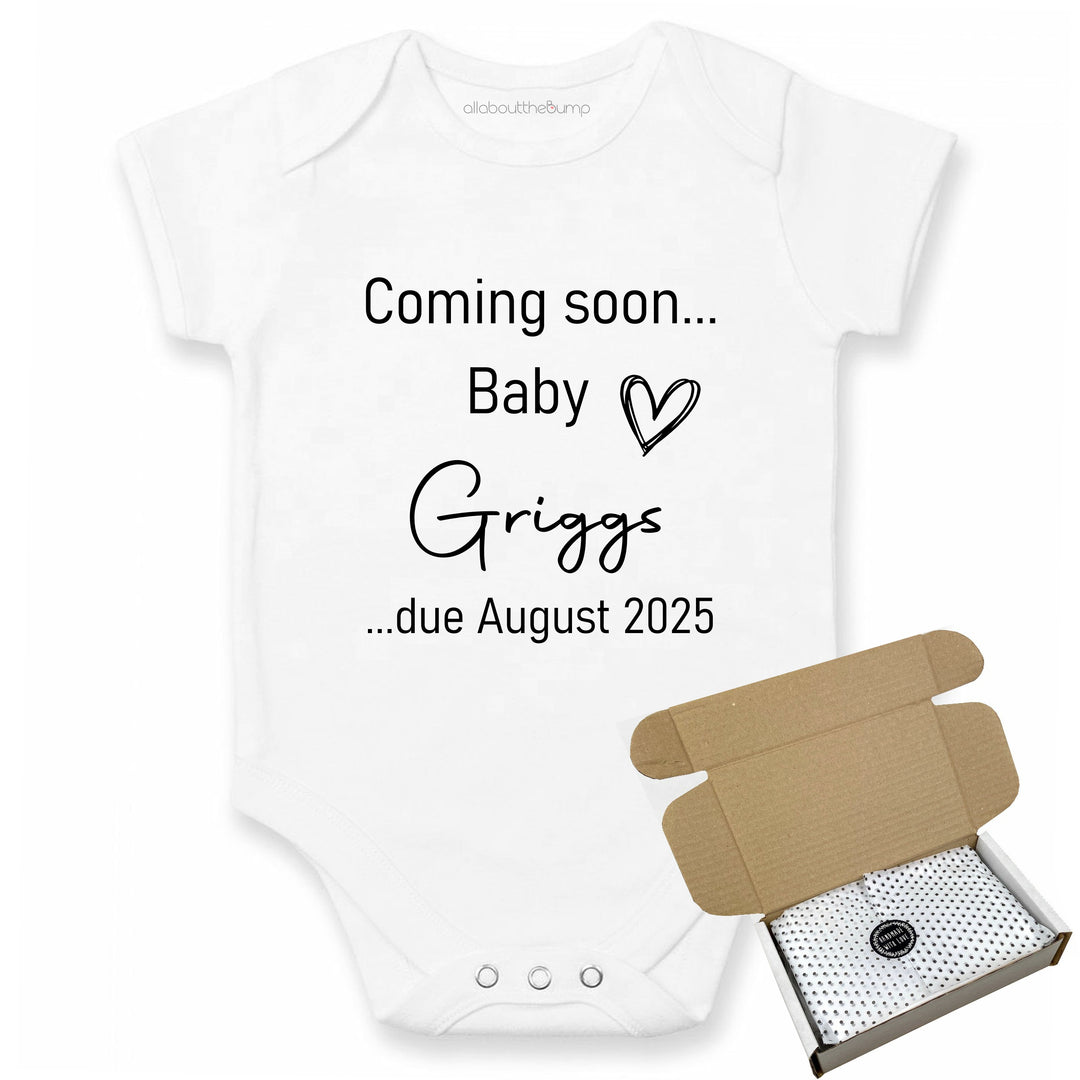 This baby announcement vest can be brought in a box lined with tissue paper