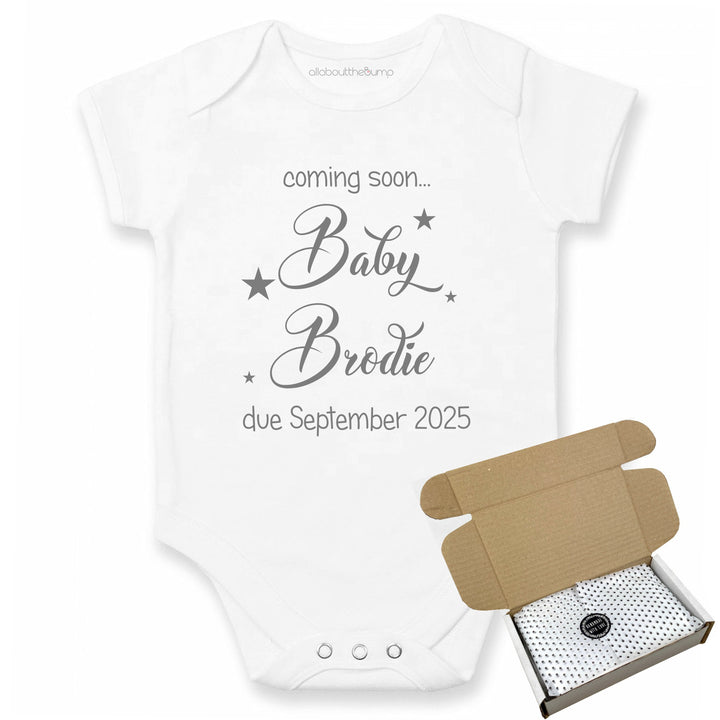 This baby announcement vest can be brought in a box lined with tissue paper