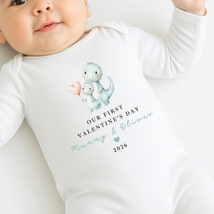 Personalised Blue Dinosaur Our First Valentines Day Baby Grow, Vest or Bib