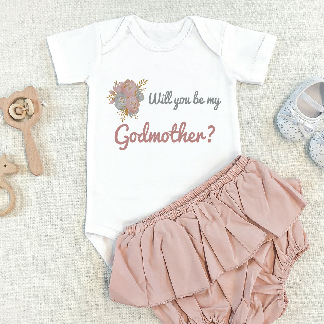 Baby announcement vests that says: 
Will you be my Godmother? 