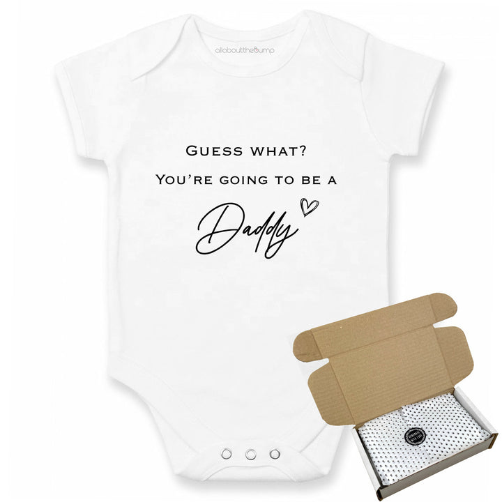 This baby announcement vest can be brought in a box lined with tissue paper