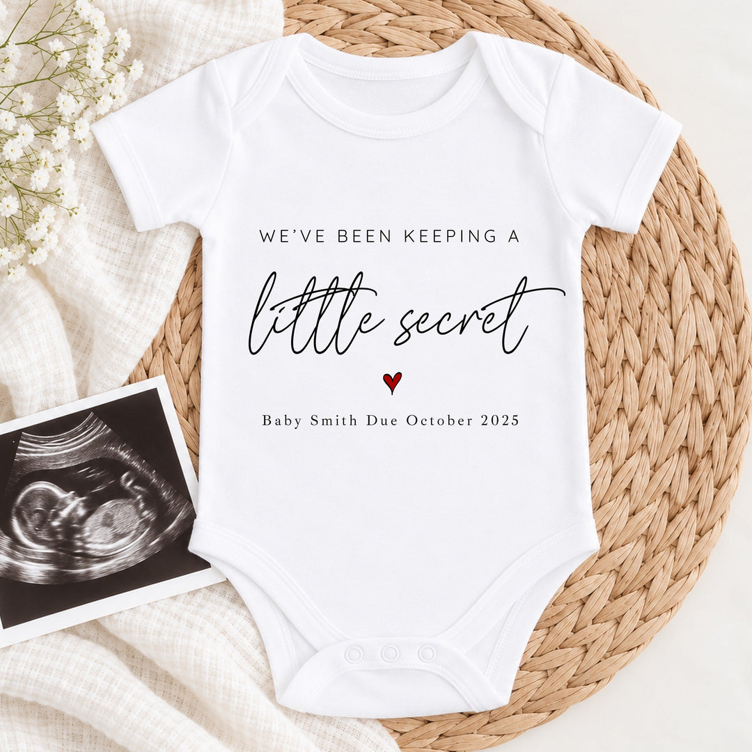 Personalised Keeping A Secret Baby Announcement Vest