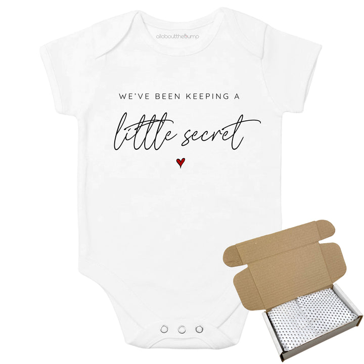 Personalised Keeping A Secret Baby Announcement Vest