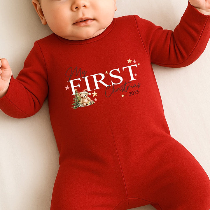 Baby wearing a red 'My First Christmas 2023' onesie on a light background
