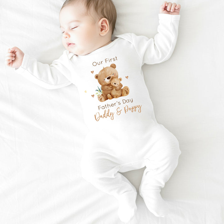 Personalised white Father's Day baby grow/sleepsuit that says 'Our First Father's Day Daddy & Poppy'. This design features 2 brown bears