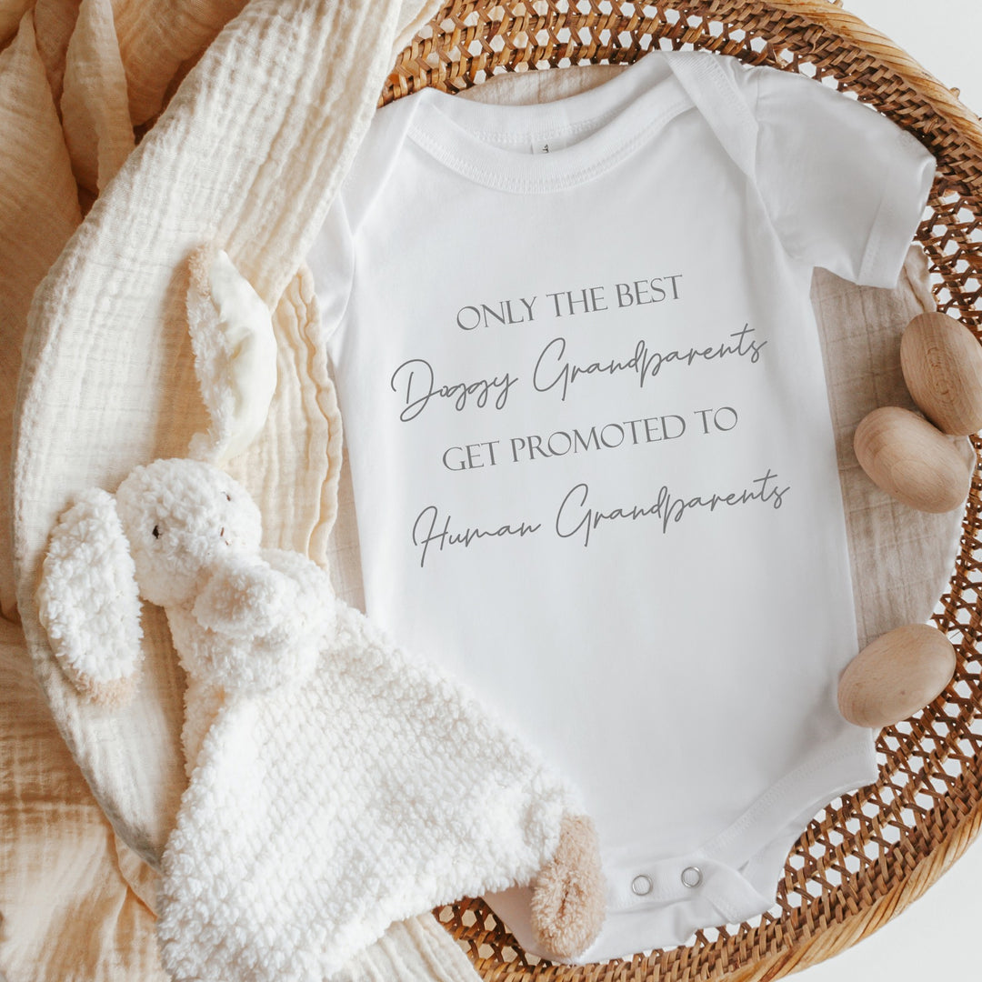 Baby announcement vests that says: 
Only the best doggy grandparents get promoted to human grandparents