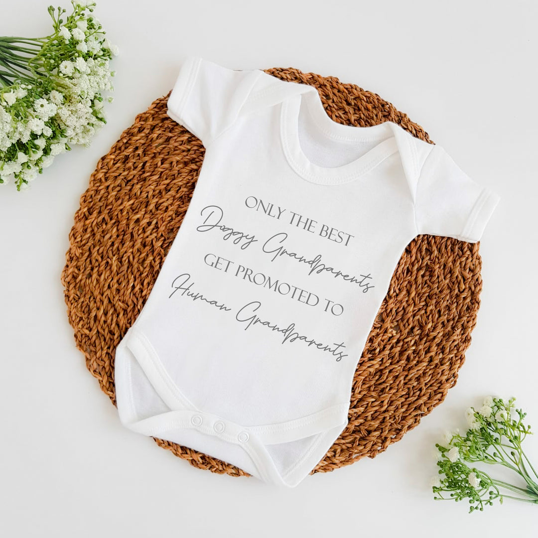 Baby announcement vests that says: 
Only the best doggy grandparents get promoted to human grandparents