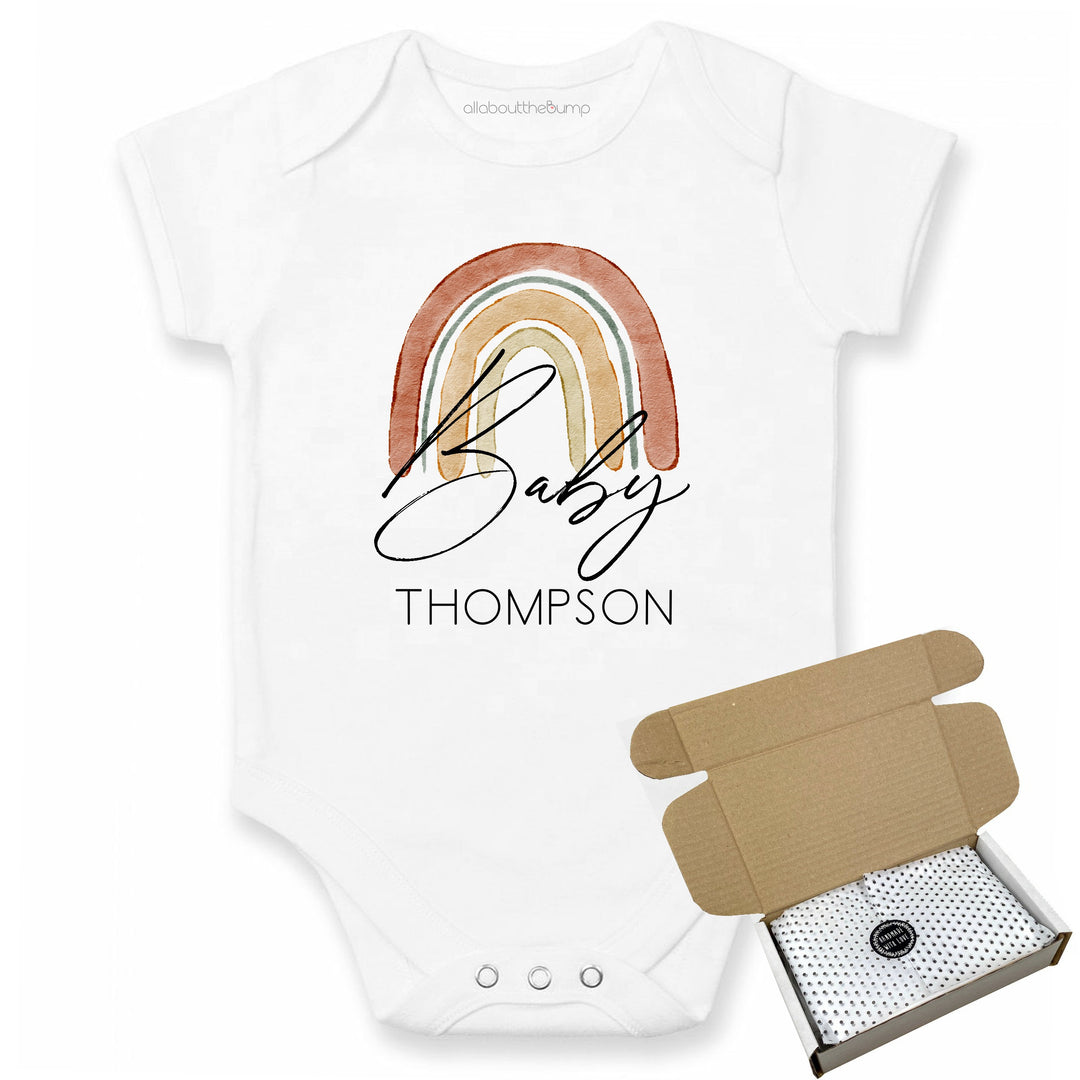 This baby announcement vest can be brought in a box lined with tissue paper