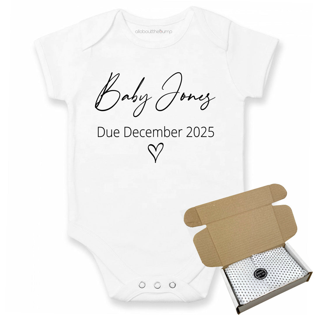 This baby announcement vest can be brought in a box lined with tissue paper