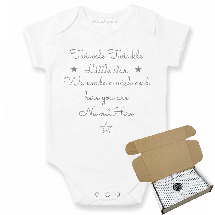 This baby announcement vest can be brought in a box lined with tissue paper