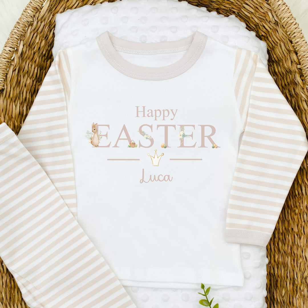 Personalised beige stripe Easter pyjamas that say 'Happy Easter Luca'. This design features a rabbit wearing a beige jacket