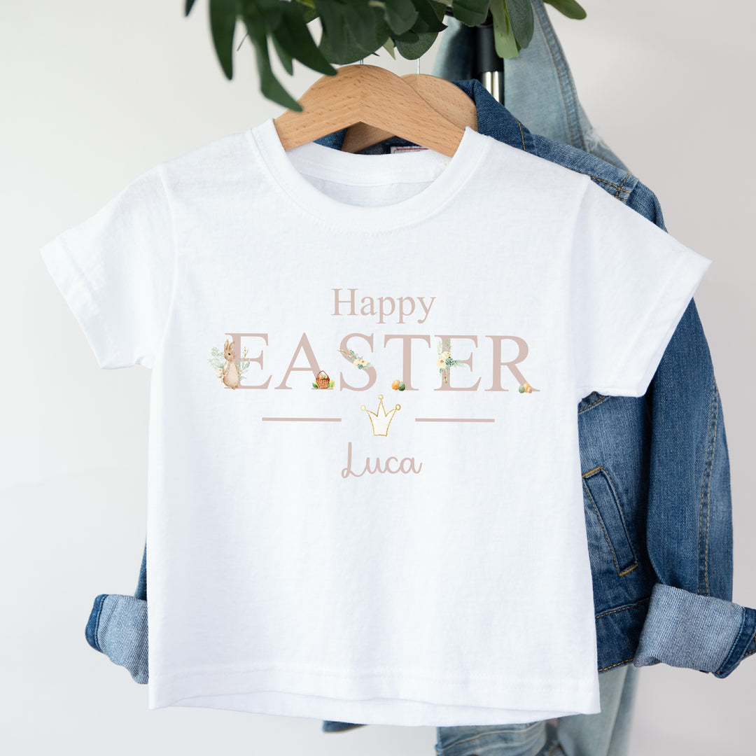 Personalised white Easter childrens t-shirt that says 'Happy Easter Luca'. This design features a rabbit wearing a beige jacket