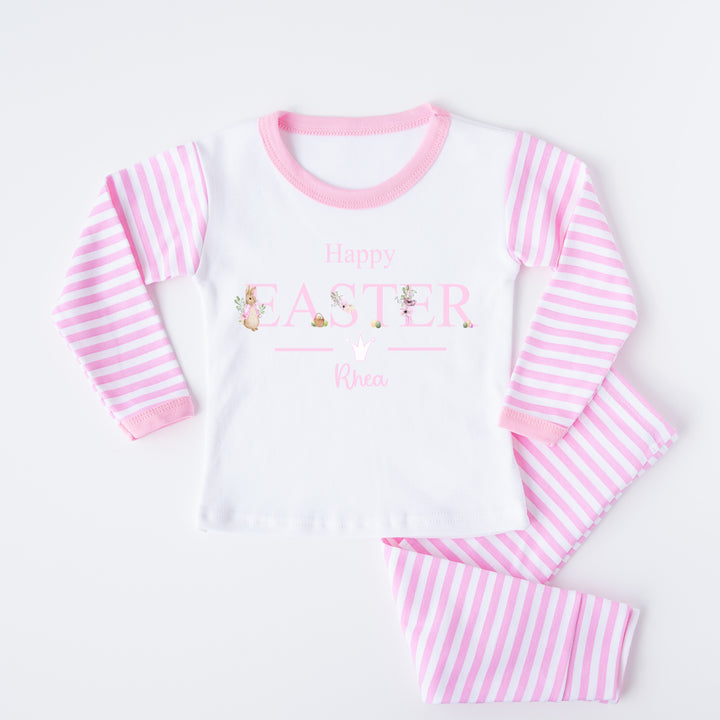 Personalised pink stripe Easter pyjamas that say 'Happy Easter Rhea'. This design features a rabbit wearing a pink jacket