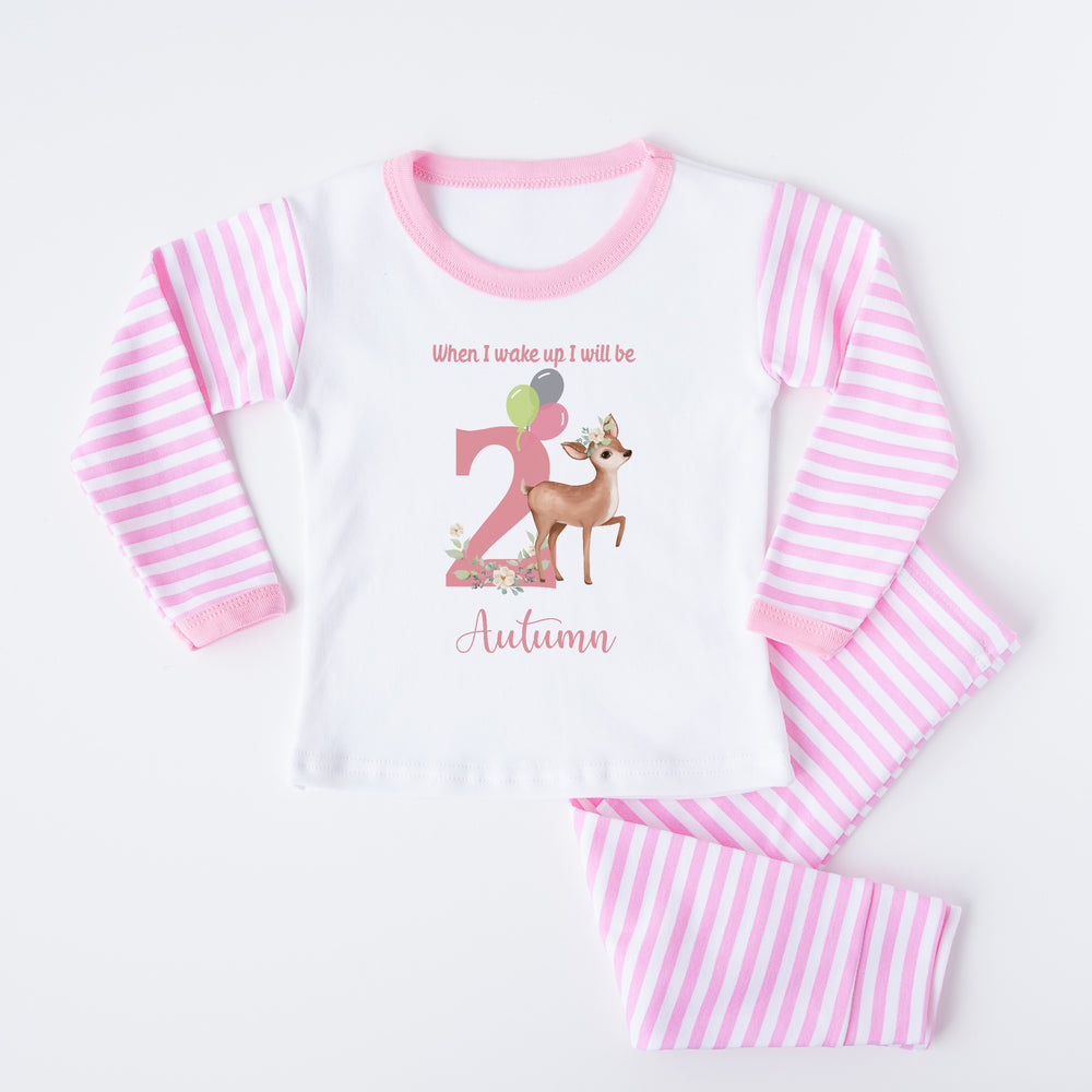 Personalised pink stripe birthday pyjamas saying 'When I wake up I will be 2 Autumn'. This design features a deer 