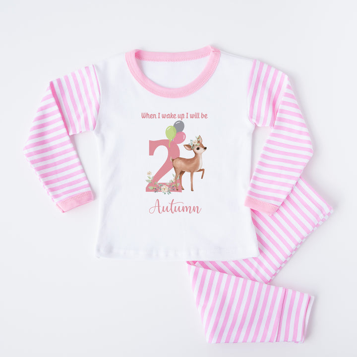 Personalised pink stripe birthday pyjamas saying 'When I wake up I will be 2 Autumn'. This design features a deer 