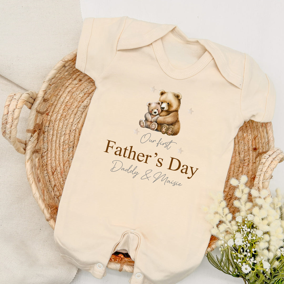 Personalised beige Father's Day baby romper that says 'Our first Father's Day Daddy & Maisie'. This design features a big brown bear and a baby brown bear